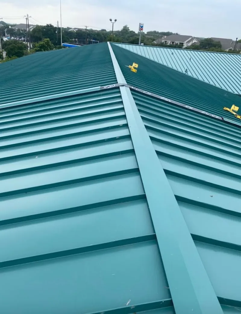 Green commercial metal roof ridge and valley for Metal Roof Repair in Lynnfield
