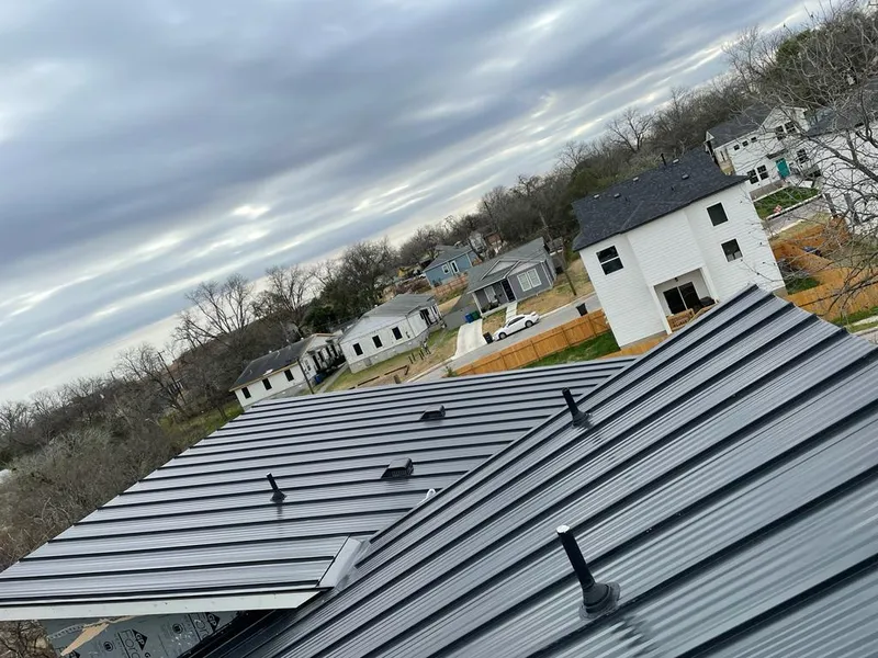 Standing seam metal roof panels with vents for Skylight Repair in Lynnfield